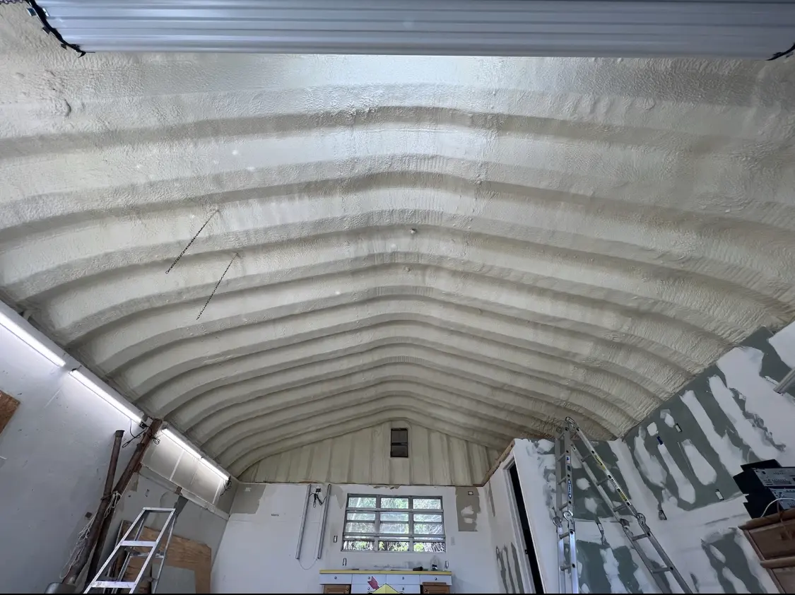 Spray polyurethane foam applied to the underside of a metal roof deck in Chalmette